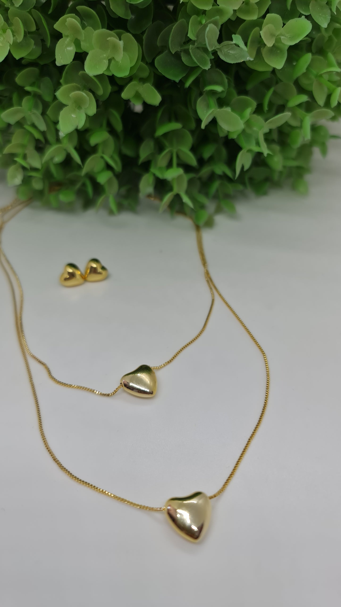 Set cadena doble con corazones macizos dorados + aros