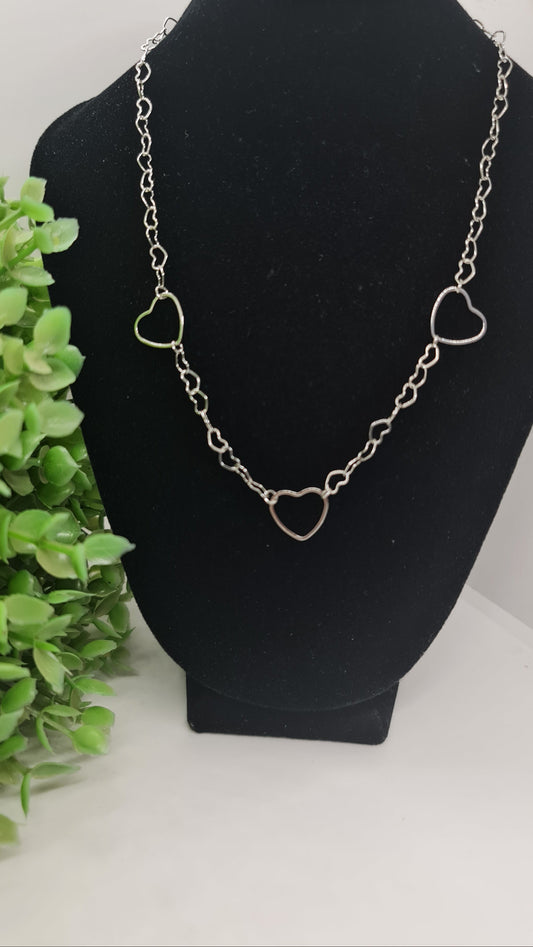 Set de cadena plata de corazones entrelazados + aros de corazones