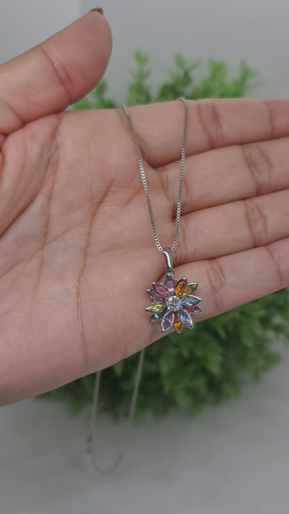 Set collar con dije de flor multicolor en punta dorada/plateada + aros